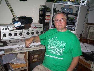 Bill Charles in the Wcbo Studio with a Reto Saturday T^ee